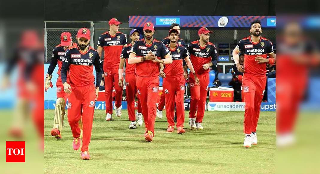rcb released players 2021